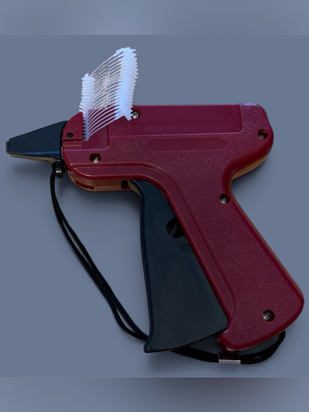 Burgundy Tagging Gun with Black Handle for Easy Price Labeling